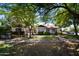 Charming neighborhood street featuring well-maintained homes with mature trees and a sidewalk, creating a welcoming atmosphere at 1301 E Sheridan St, Phoenix, AZ 85006