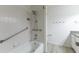 Clean bathroom with shower and tub combination featuring accessibility support at 1360 E Brown Rd # 9, Mesa, AZ 85203