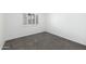 Cozy bedroom with neutral walls and plush carpeting, perfect for relaxation at 1360 E Brown Rd # 9, Mesa, AZ 85203