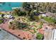 Overhead view of the community's miniature golf course, featuring well-maintained greens and lush landscaping at 13640 N Del Webb Blvd, Sun City, AZ 85351
