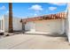 Charming single-story home showcasing a red tile roof and attached two-car garage at 13640 N Del Webb Blvd, Sun City, AZ 85351