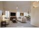 Inviting living room featuring neutral tones, comfortable seating, and elegant decor at 14130 W Bent Tree Cir, Litchfield Park, AZ 85340