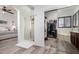 Bathroom features walk-in shower, vanity, and access to walk-in closet at 15062 W Windward Ave, Goodyear, AZ 85395