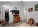Bedroom with wood floors, a ceiling fan, and two closets at 15062 W Windward Ave, Goodyear, AZ 85395