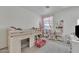 Bedroom with bunk bed, study area, and plenty of space for toys at 16847 W Marconi Ave, Surprise, AZ 85388