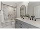 Elegant bathroom featuring double sinks, modern faucets, and marble tile shower at 1700 E Lakeside Dr # 16, Gilbert, AZ 85234
