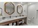 Bathroom with double vanity, decorative mirrors, and hexagon tile floors at 1700 E Lakeside Dr # 16, Gilbert, AZ 85234