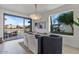 Modern dining room with a lake view, contemporary lighting, and stylish furniture at 1700 E Lakeside Dr # 16, Gilbert, AZ 85234