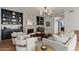 Bright living room featuring built-in shelving, a fireplace, and comfortable seating at 1700 E Lakeside Dr # 16, Gilbert, AZ 85234