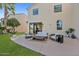 Inviting outdoor patio space with cozy seating, perfect for relaxing and entertaining in a serene setting at 1700 E Lakeside Dr # 16, Gilbert, AZ 85234