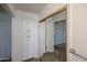 Hallway featuring a full-length mirror closet and built in cabinets at 17405 N Conquistador Dr, Sun City West, AZ 85375