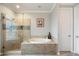 A bright bathroom with a glass shower, soaking tub, and modern tile flooring at 17773 N 77Th Way, Scottsdale, AZ 85255