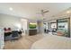 Spacious main bedroom featuring light wood floors and sliding doors to outside space at 17773 N 77Th Way, Scottsdale, AZ 85255