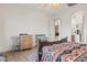 Cozy bedroom featuring a ceiling fan, tile flooring, and stylish furniture at 18391 W Verdin Rd, Goodyear, AZ 85338
