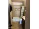 Bathroom featuring a shower-tub combo with decorative tile and a granite-topped vanity at 1858 N Hibbert Cir, Mesa, AZ 85201