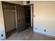 Bedroom with neutral walls, tile floors and a closet at 1858 N Hibbert Cir, Mesa, AZ 85201