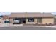 Charming single story home with covered parking and desert landscaping at 1858 N Hibbert Cir, Mesa, AZ 85201