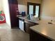 Kitchen featuring updated appliances and a large countertop at 1858 N Hibbert Cir, Mesa, AZ 85201