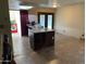 Bright kitchen area with a large window and stainless steel appliances at 1858 N Hibbert Cir, Mesa, AZ 85201