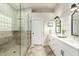 Elegant bathroom featuring glass shower, double sinks, and designer finishes at 2043 E Clipper Ln, Gilbert, AZ 85234