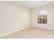 Bright bedroom features a large window offering plenty of natural light and a neutral color scheme at 2043 E Clipper Ln, Gilbert, AZ 85234