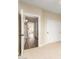 Hallway leads to other rooms with carpet and wood flooring, open doors and natural light at 2043 E Clipper Ln, Gilbert, AZ 85234