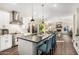 Spacious kitchen with an island, stainless steel appliances, and an open concept layout at 2043 E Clipper Ln, Gilbert, AZ 85234