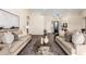 Spacious living area with neutral tones, wood floors, recessed lighting, and stylish furnishings at 2043 E Clipper Ln, Gilbert, AZ 85234
