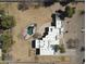 Bird's eye view of white adobe home, pool and desert landscaping at 22236 E Nacoma --, Queen Creek, AZ 85142
