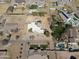 Expansive aerial view of a white home with a private pool and large yard in a suburban neighborhood at 22236 E Nacoma --, Queen Creek, AZ 85142