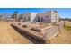 Large, fenced backyard with garden beds ready for planting at 22236 E Nacoma --, Queen Creek, AZ 85142