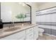Bathroom featuring double sinks, a large mirror, and ample lighting, creating a convenient space at 22236 E Nacoma --, Queen Creek, AZ 85142