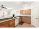 Kitchen view featuring bright lighting, light wood cabinets, and neutral countertops at 22236 E Nacoma --, Queen Creek, AZ 85142