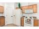 Well-lit kitchen featuring updated appliances and fixtures with lots of storage space at 22236 E Nacoma --, Queen Creek, AZ 85142
