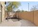 Private backyard featuring a custom fountain and desert landscaping, perfect for outdoor relaxation at 2568 E Boston St, Gilbert, AZ 85295