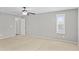 Bedroom featuring plush carpeting, a ceiling fan, and a window for natural light at 2568 E Boston St, Gilbert, AZ 85295