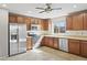 Kitchen featuring stainless steel appliances, tile countertops, and ample cabinetry at 2568 E Boston St, Gilbert, AZ 85295