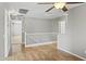 Upstairs loft featuring wood floors, neutral paint, and two entry ways at 2568 E Boston St, Gilbert, AZ 85295