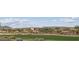 Picturesque community view overlooking lush green lawns and mature trees at 28798 N 127Th Ave, Peoria, AZ 85383