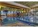 Indoor lap pool with clear lane markings and large windows for natural light at 28798 N 127Th Ave, Peoria, AZ 85383