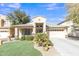 Well-maintained home with low-maintenance desert landscaping and inviting curb appeal at 2910 E Quiet Hollow Ln, Phoenix, AZ 85024