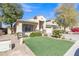 Charming single-Gathering home featuring well-manicured lawn and desert landscaping for low maintenance at 2910 E Quiet Hollow Ln, Phoenix, AZ 85024