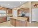 Well-lit kitchen with granite countertops, stainless steel appliances, and central island at 2910 E Quiet Hollow Ln, Phoenix, AZ 85024