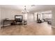 Open floor plan with a large desk area, tile flooring, and a chandelier at 4037 S Taylor Dr, Tempe, AZ 85282