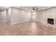 Large living room featuring tile flooring, fireplace, recessed lighting and a ceiling fan at 4037 S Taylor Dr, Tempe, AZ 85282