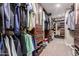 Spacious walk-in closet with custom shelving and ample storage at 4037 S Taylor Dr, Tempe, AZ 85282