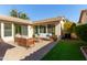 Charming outdoor patio area featuring stylish furniture and well-maintained landscaping at 4428 E Wildhorse Dr, Gilbert, AZ 85297