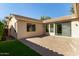 Private covered patio with tile flooring, stucco walls and manicured lawn at 4428 E Wildhorse Dr, Gilbert, AZ 85297
