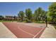 Full-sized community basketball court featuring picnic tables and mature trees at 4428 E Wildhorse Dr, Gilbert, AZ 85297
