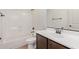 Clean bathroom with shower/tub combo with dark fixtures and modern vanity at 4428 E Wildhorse Dr, Gilbert, AZ 85297